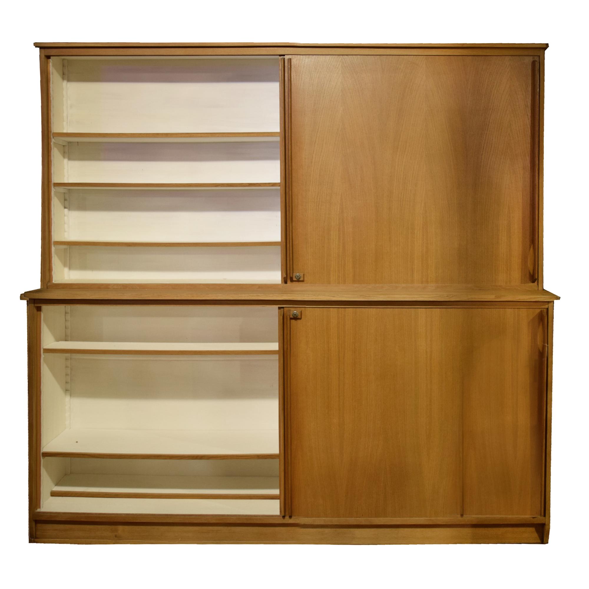 A Mid-Century Two-Tier Wood Cabinet 89" W x 17" D x 84.5" H — France, Mid-20th Century