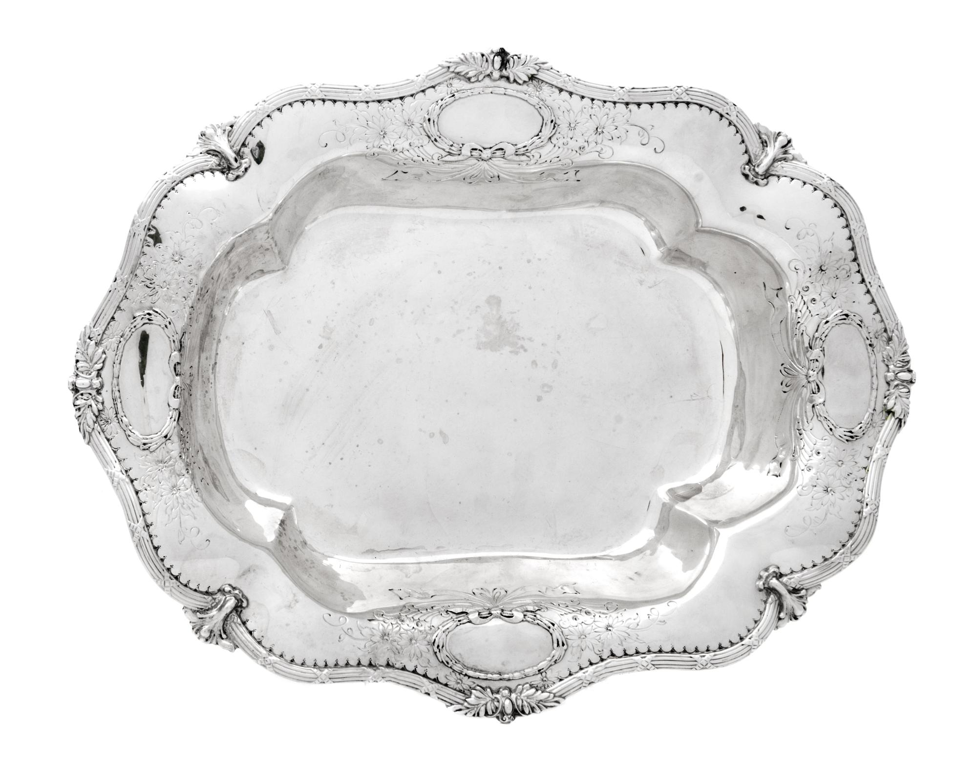 An American Silver Serving Dish, Likely Redlich & Co., New York, NY, the rim worked to show bundled reed and foliate motifs, the border