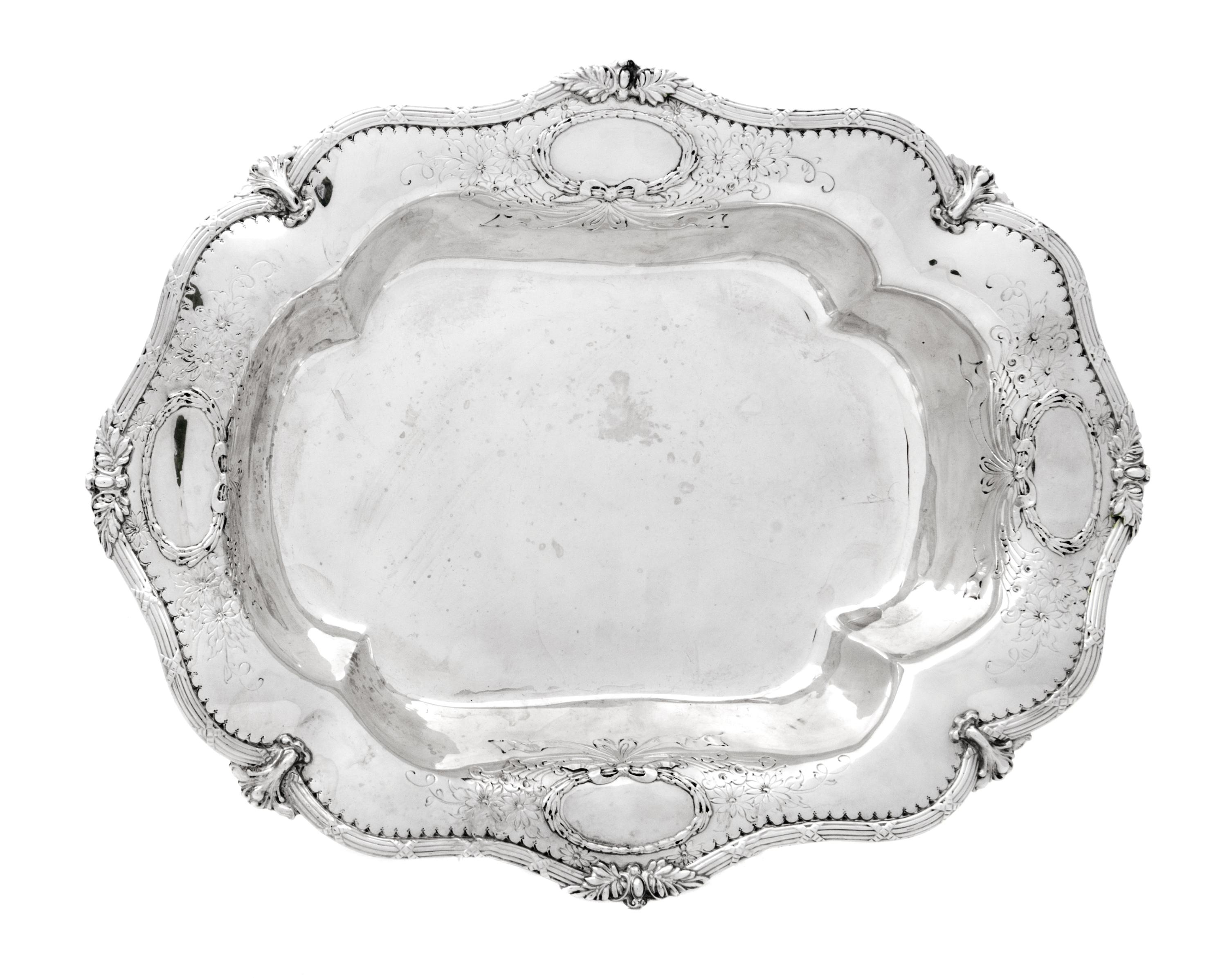 An American Silver Serving Dish, Likely Redlich & Co., New York, NY, the rim worked to show bundled reed and foliate motifs, the border