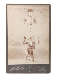 [EARLY PHOTOGRAPHY - CIRCUS ACTS & COSTUMES]. A collection of 50+ quirky and unusual photographs highlighted by circus performers, costumed subjects, and other oddities, including: