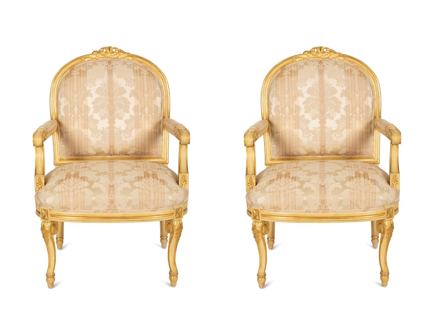 A Pair of Continental Painted and Giltwood Fauteuils