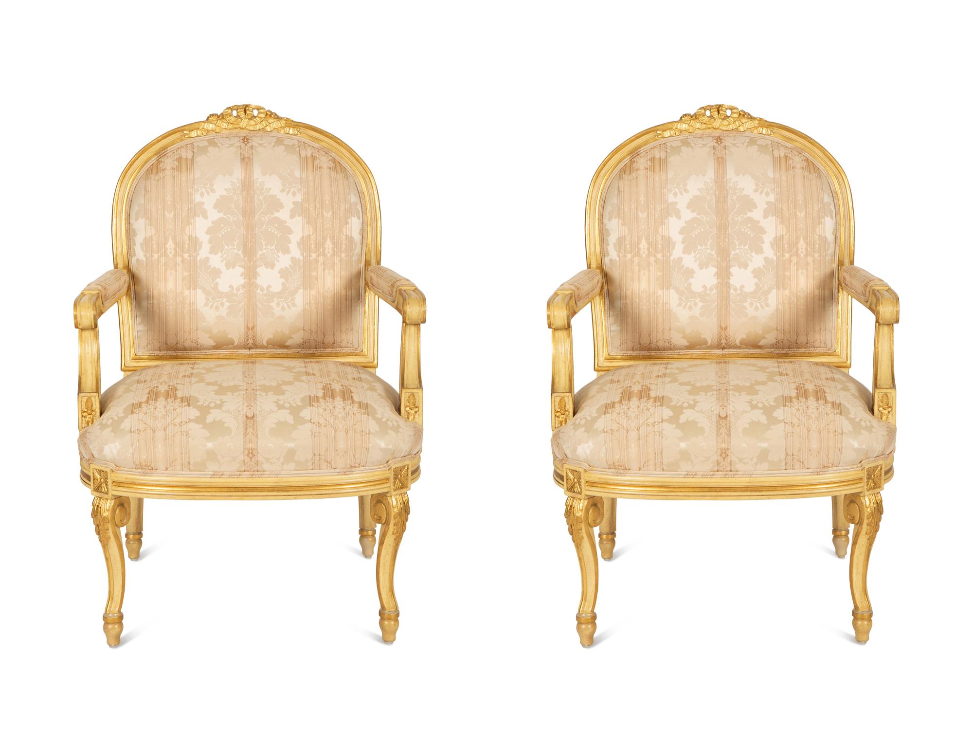 A Pair of Continental Painted and Giltwood Fauteuils