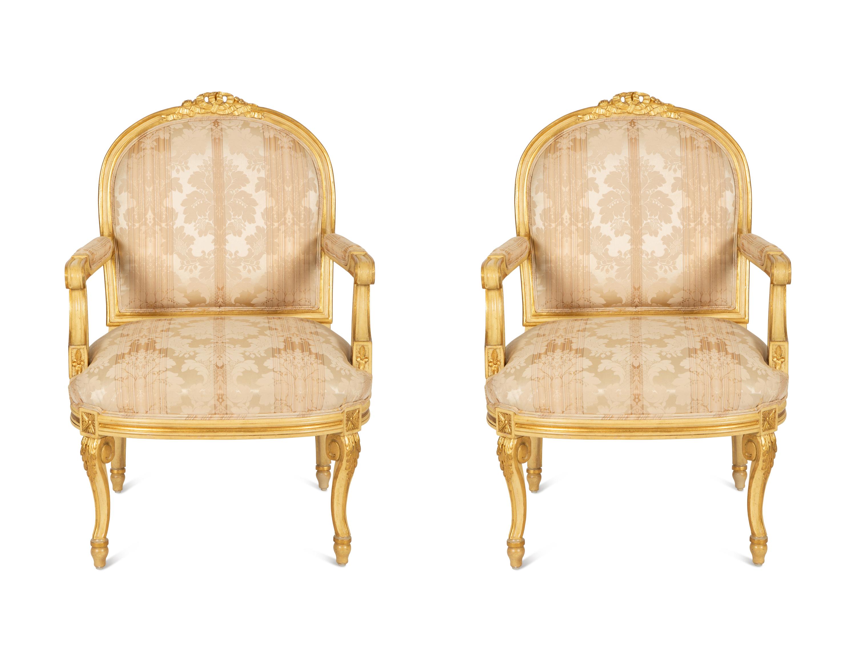 A Pair of Continental Painted and Giltwood Fauteuils