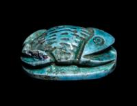 An Egyptian Faience Frog Scaraboid
