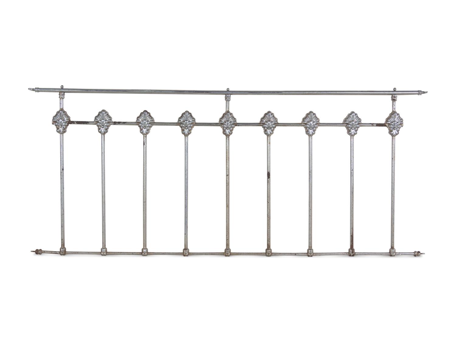 A Continental Steel Four-Post Bed