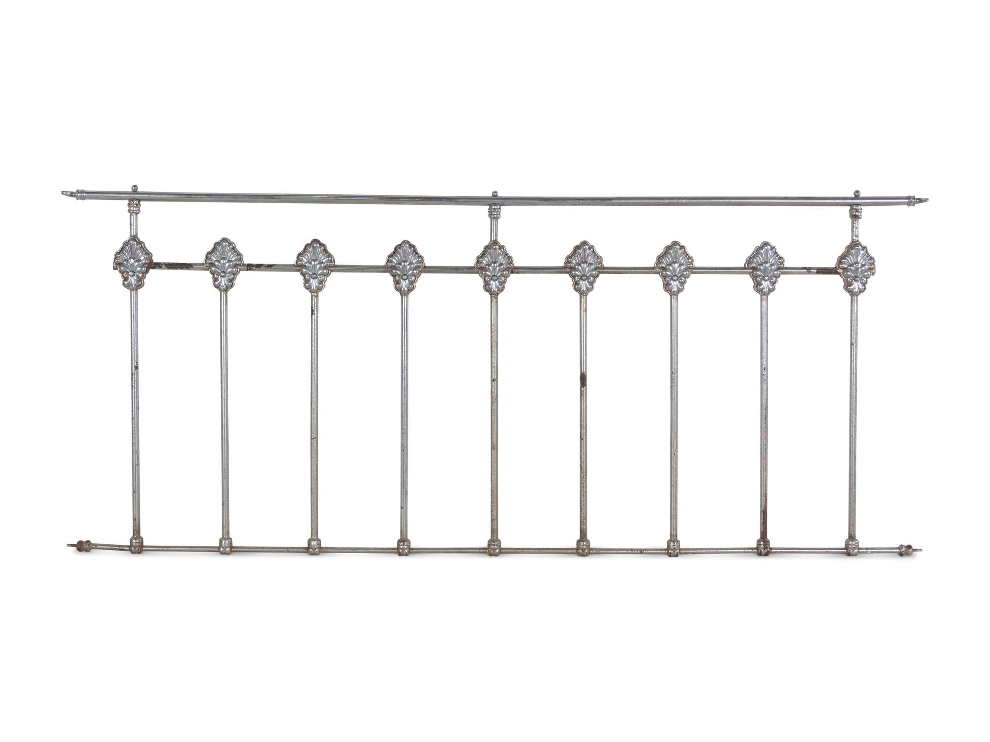 A Continental Steel Four-Post Bed