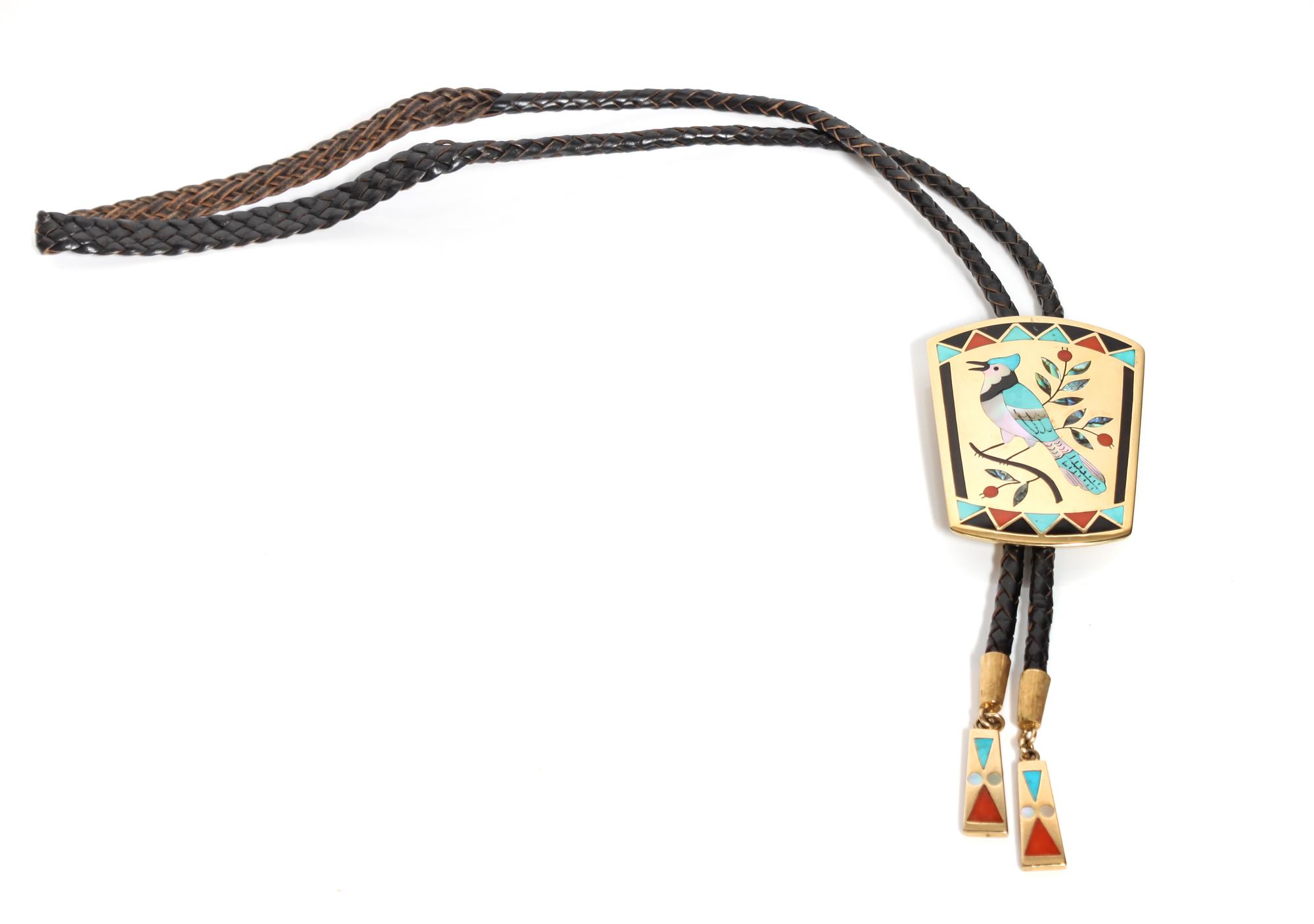 Zuni 18 Karat Yellow Gold Inlaid Bolo, Dennis Edaakie (b. 1931) Height 2 5/8 x width 2 inches