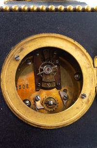 A French Gilt Bronze Mounted Carriage Clock