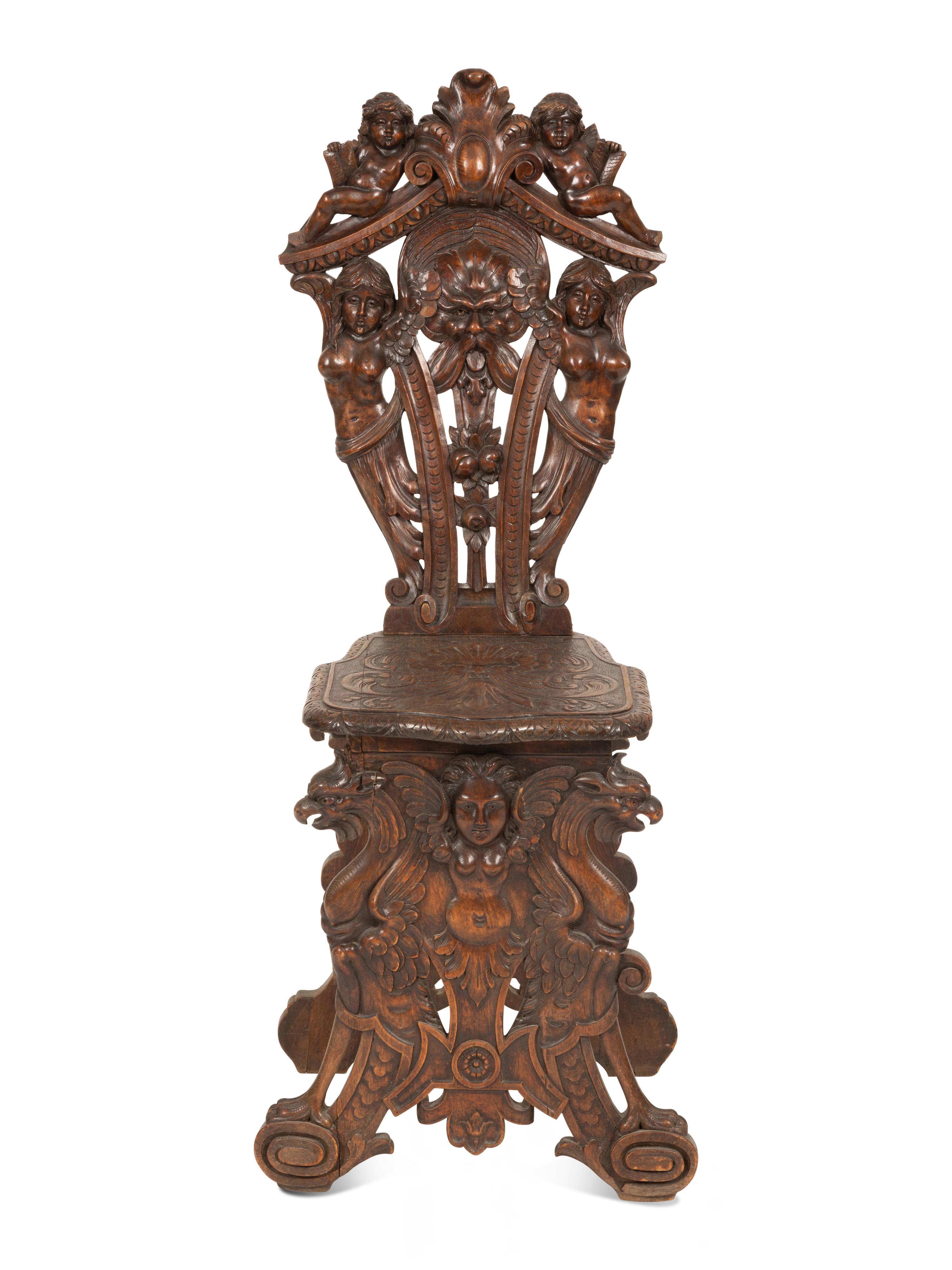 An Italian Renaissance Revival Carved Walnut Sgabello Hall Chair