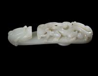 A Chinese White Jade 'Dragon' Belt Hook, Daigou
