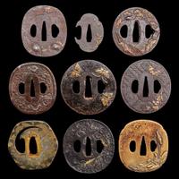 A group of nine assorted Japanese iron, brass, and soft metal tsuba 日本刀镡一组九件 Edo-Meiji period ?????