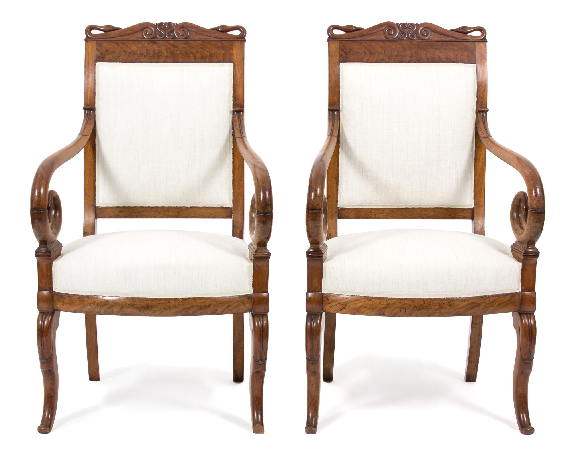 A Pair of Louis Philippe Burl Walnut Swan Crested Armchairs Height 39 x width 23 x depth 18 1/2 inches. — 20TH CENTURY