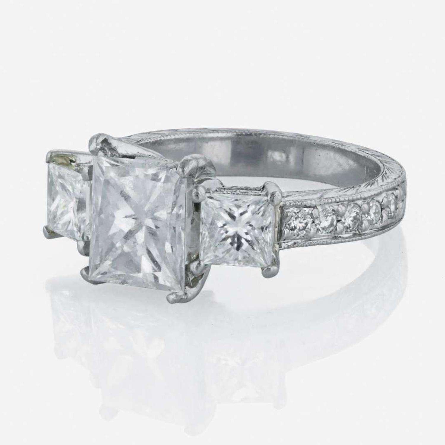 A platinum and diamond ring