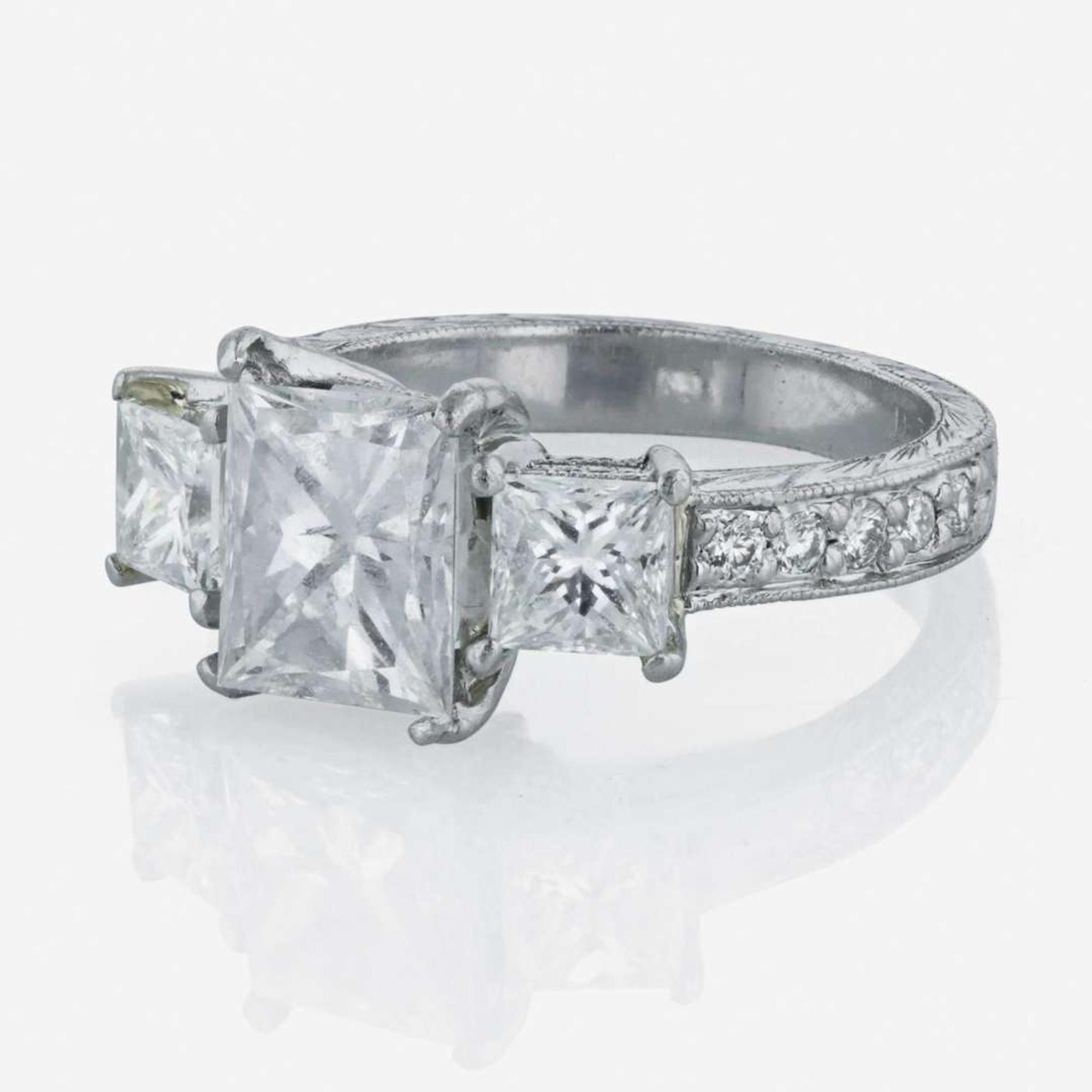 A platinum and diamond ring