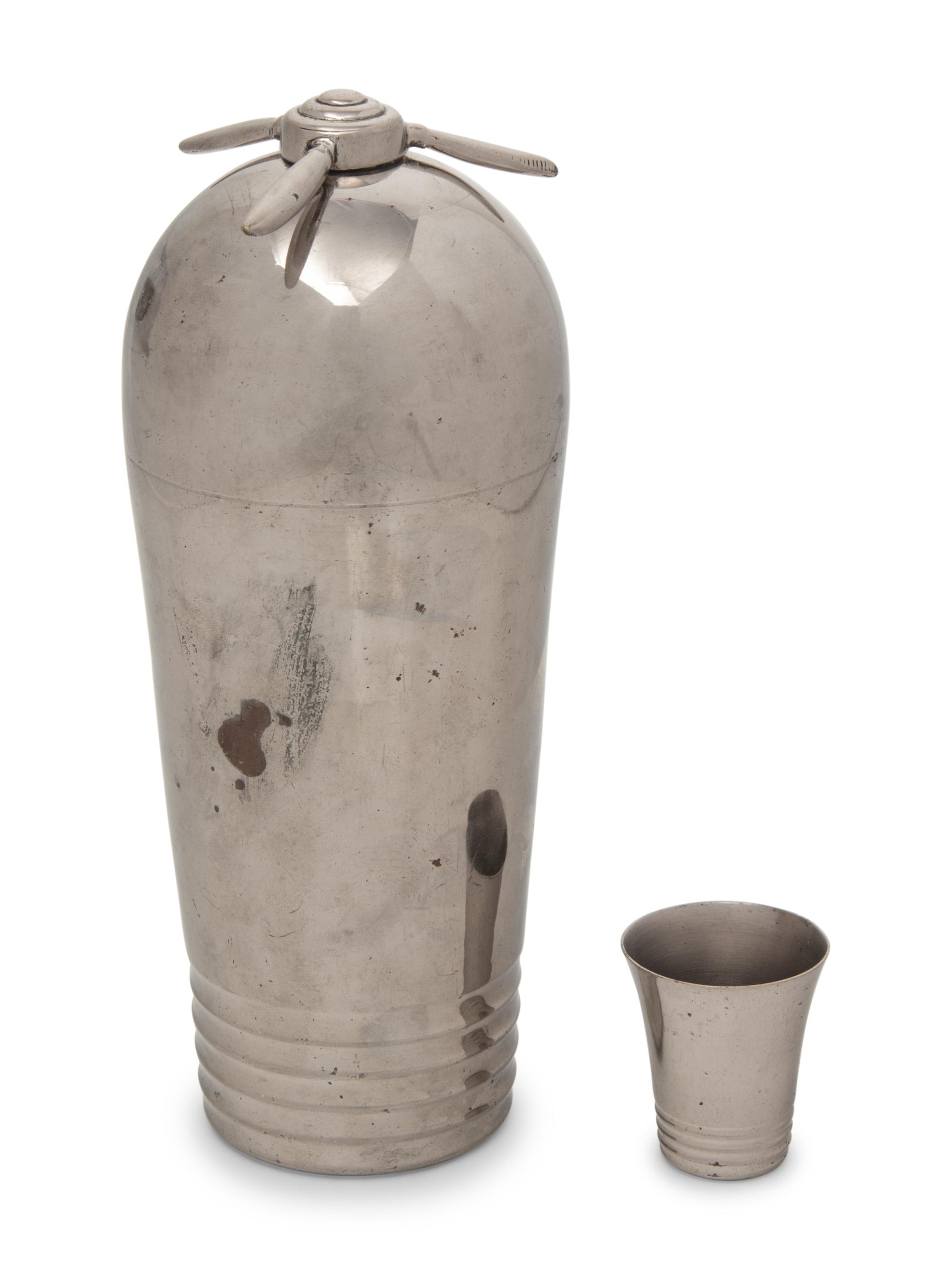 A Silver-Plate Airplane-Form Cocktail Shaker and Shot Glass Set