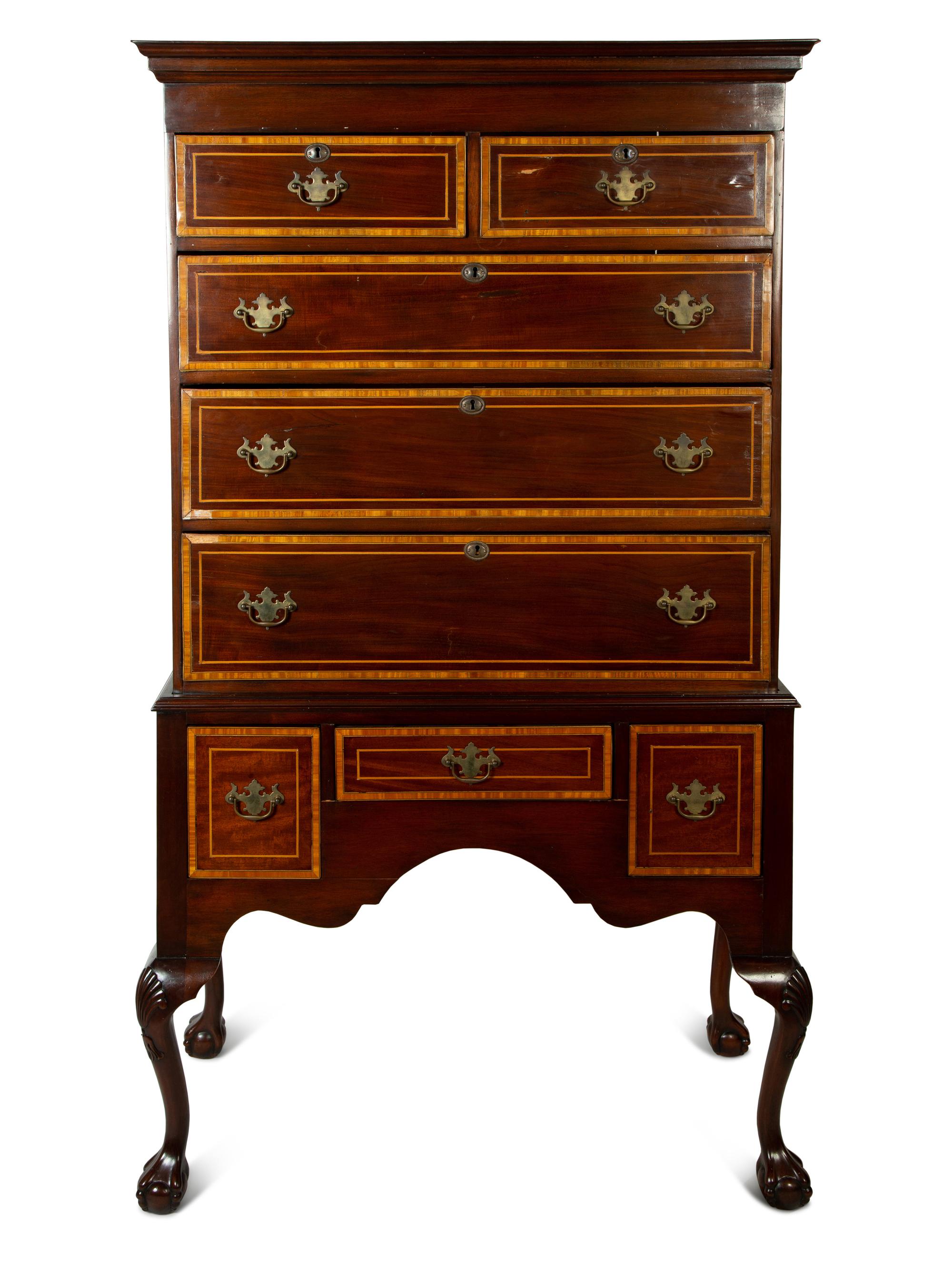 A Queen Anne Style Mahogany and Satinwood High Chest