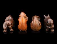 Four Japanese Carved Wood 'Animal' Netsuke