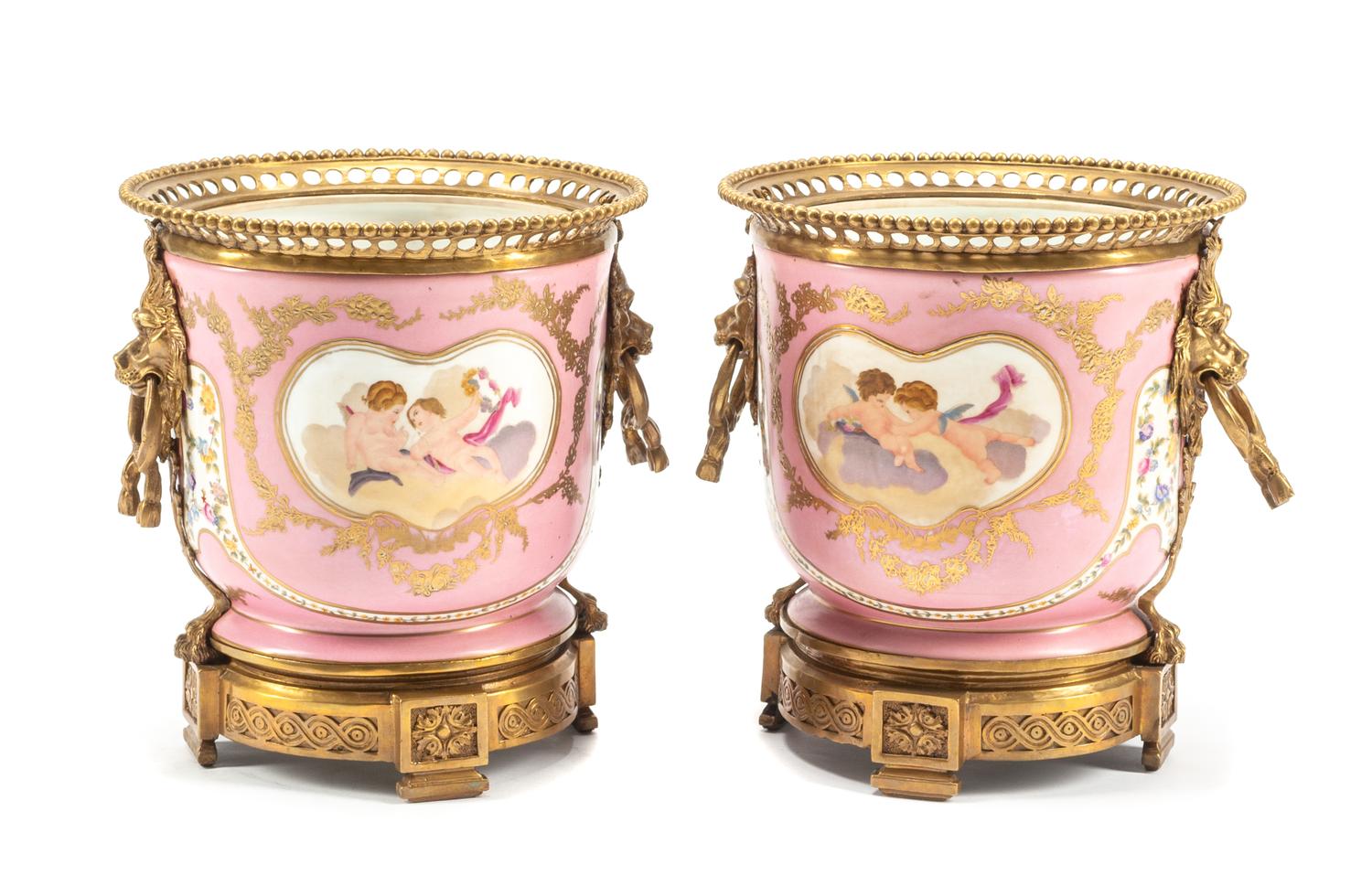 A Pair of Gilt Bronze Mounted Sevres Style Porcelain Cache Pots Height 11 inches.