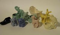A Group of Seven Haeger Pottery Figural Vases Height of tallest 6 1/2 inches.