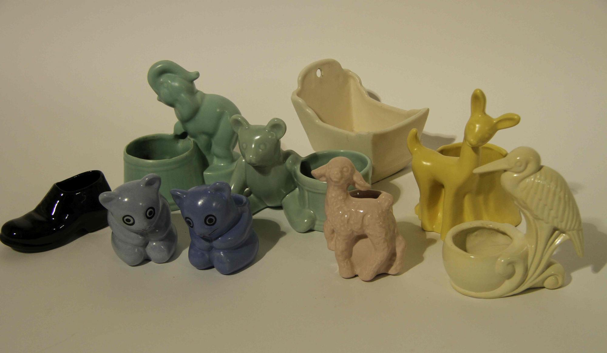 A Group of Seven Haeger Pottery Figural Vases Height of tallest 6 1/2 inches.