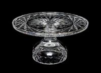 A Pressed Glass Cake Stand Height 5 1/4 x diameter 10 inches.