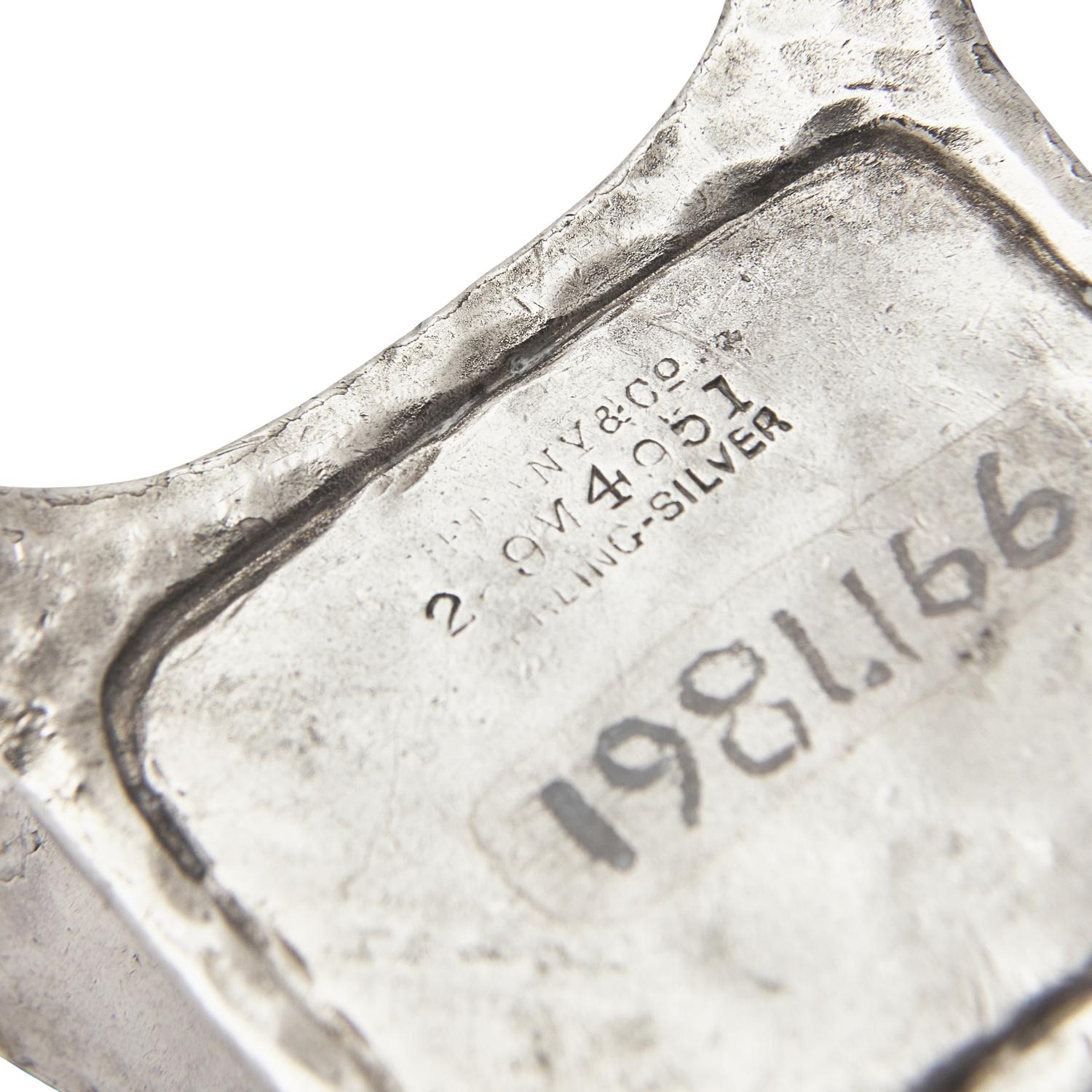 A Set of Four Aesthetic Movement Hammered Sterling Silver Salt Cellars