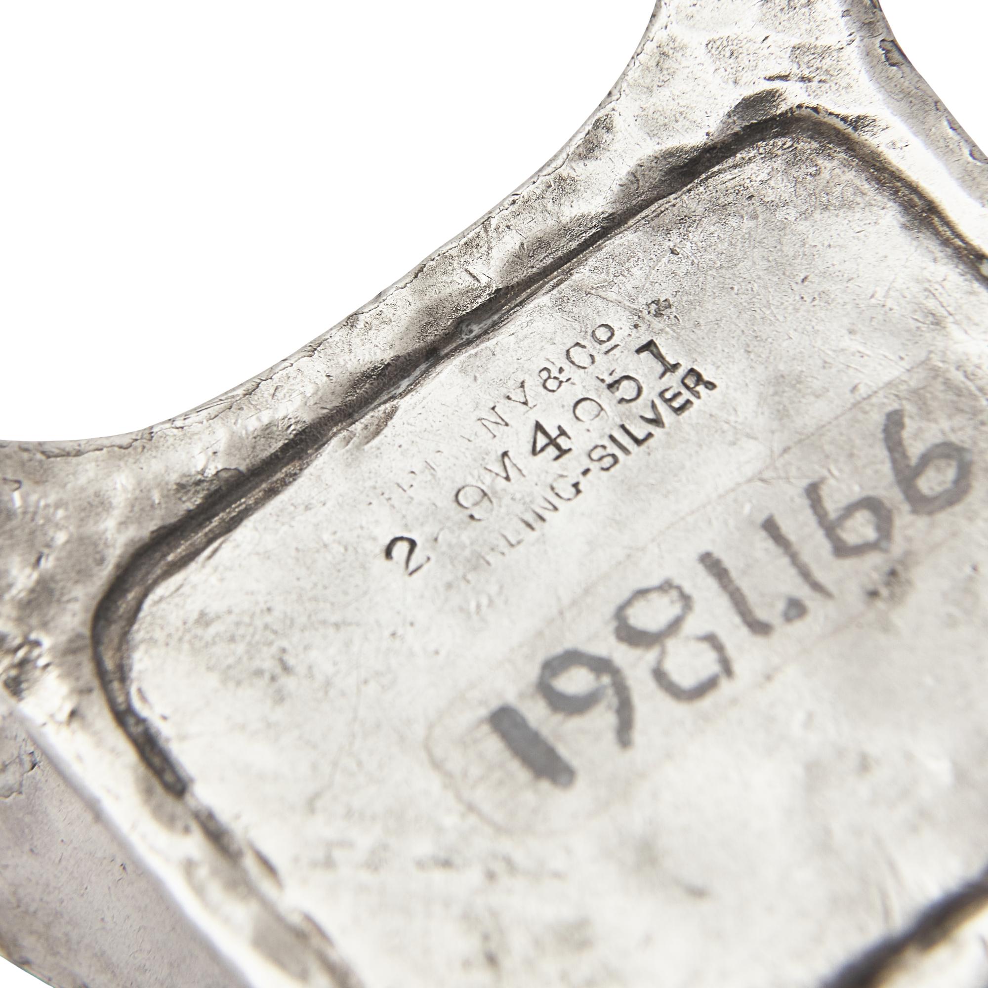 A Set of Four Aesthetic Movement Hammered Sterling Silver Salt Cellars