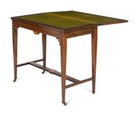 A Late Regency Rosewood and Marquetry Flip-Top Game Table