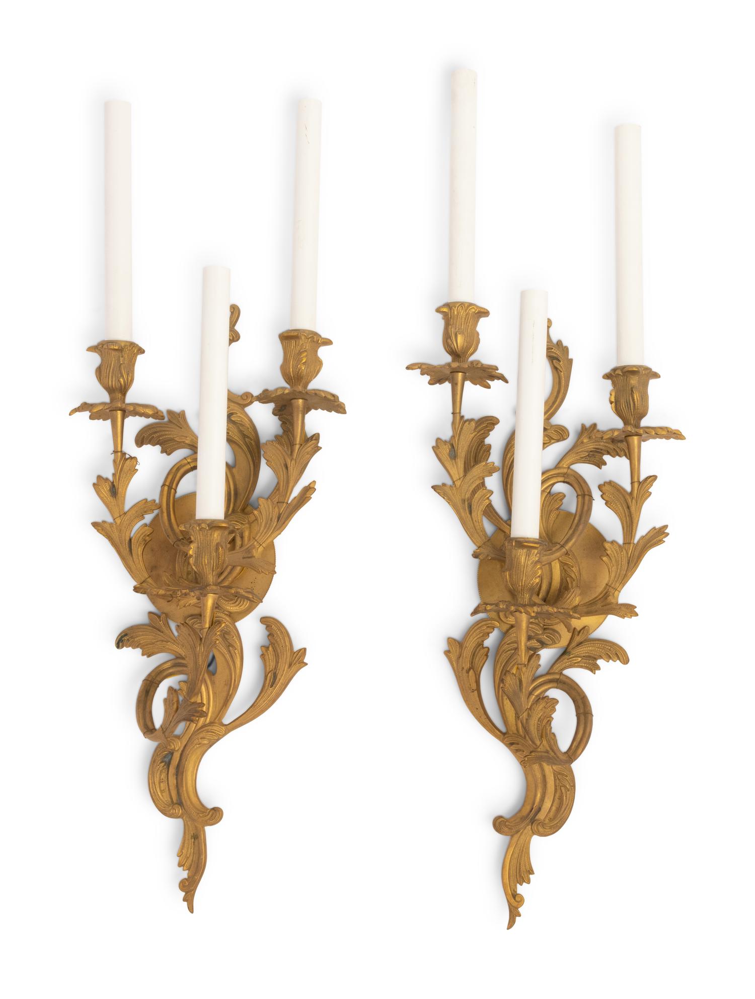A Pair of Louis XV Style Gilt Bronze Three-Light Sconces