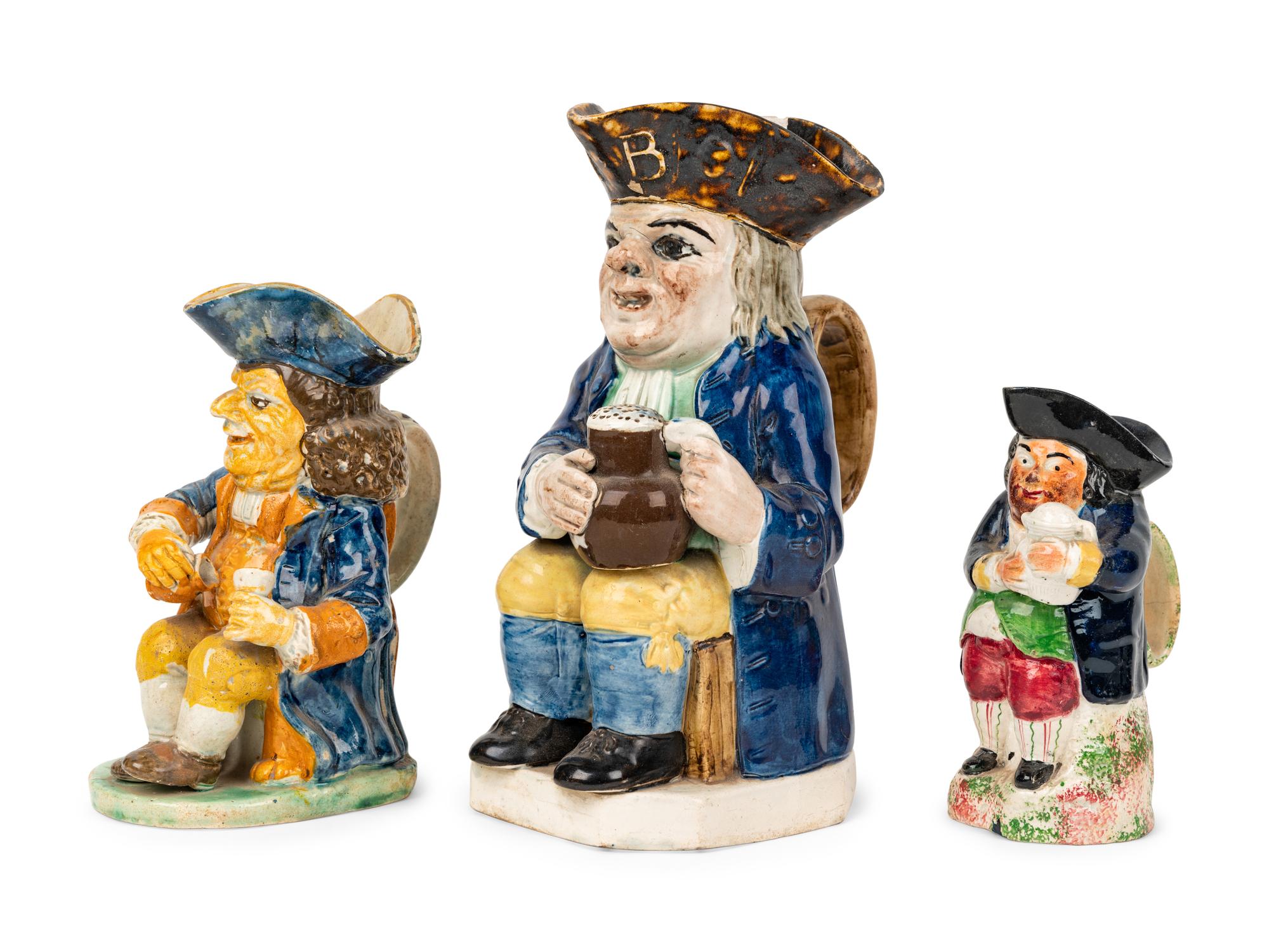 A Dr. Johnson Toby Jug and Two Other Toby Jugs