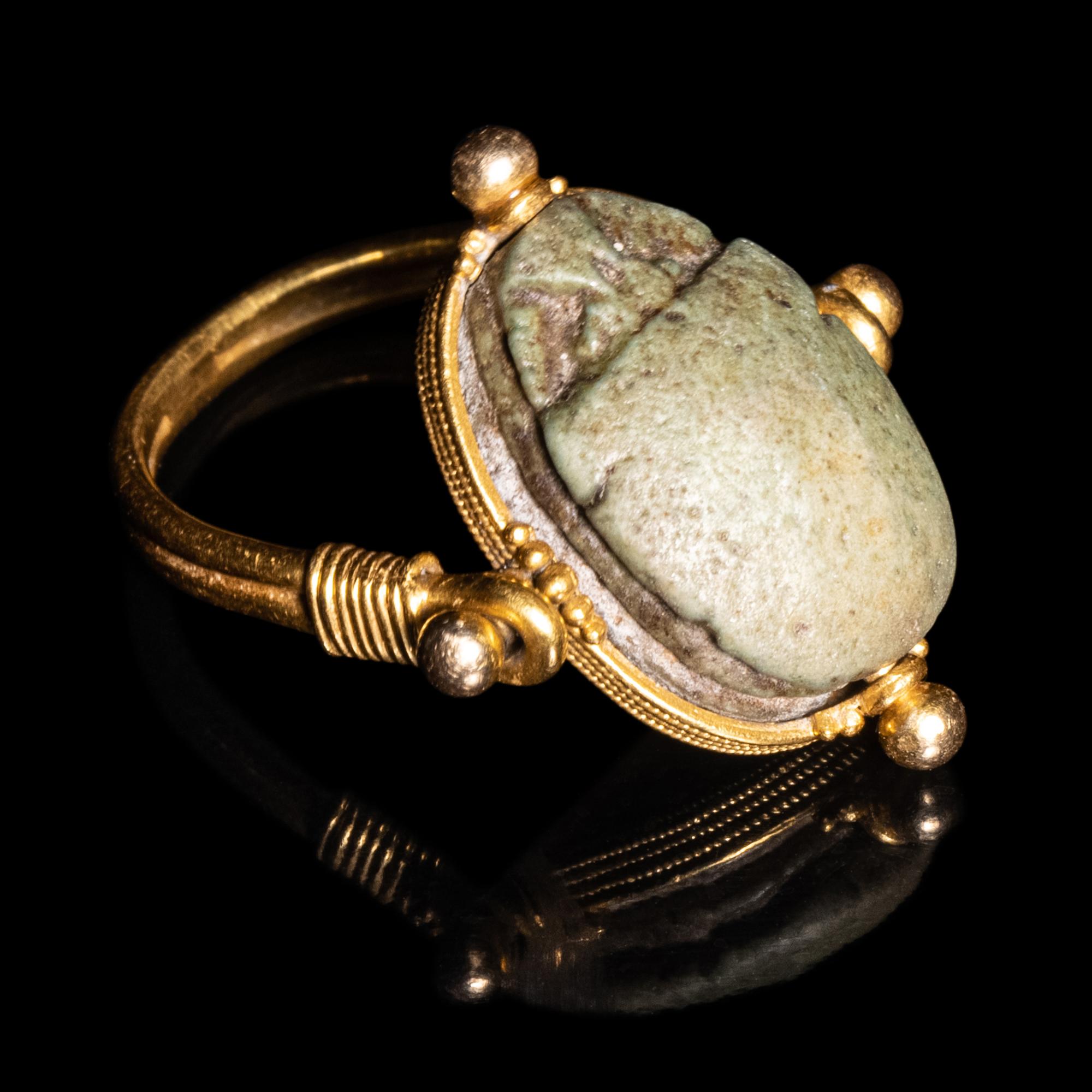 An Egyptian Faience Scarab Swivel Ring