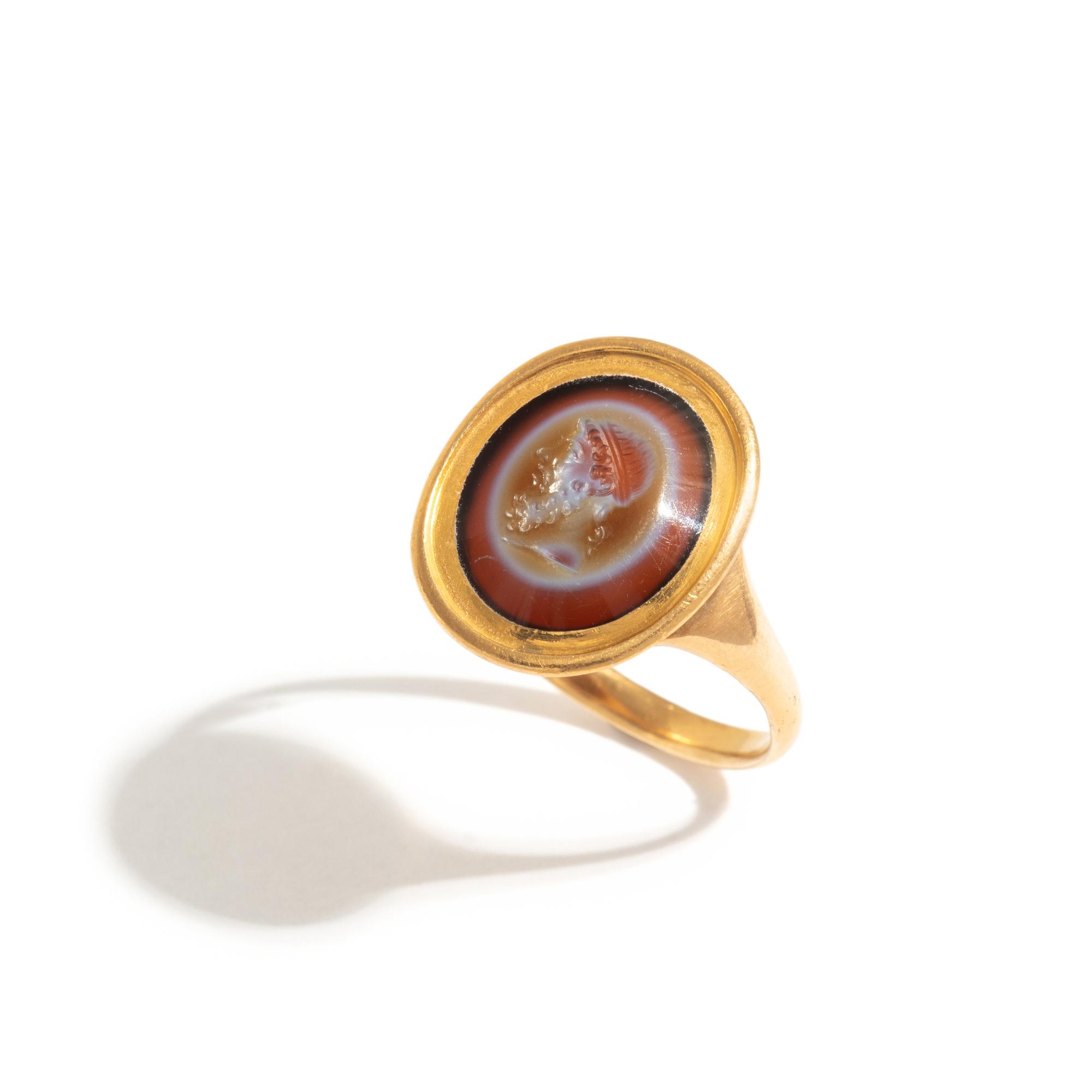 A Roman Banded Agate Ring Stone with the God Dionysus — Set in a gold ring