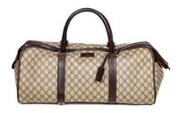 A Gucci Monogram Canvas Duffle Bag, 9.5" H x 21.5" W x 10.5" D; Handle drop: 6".