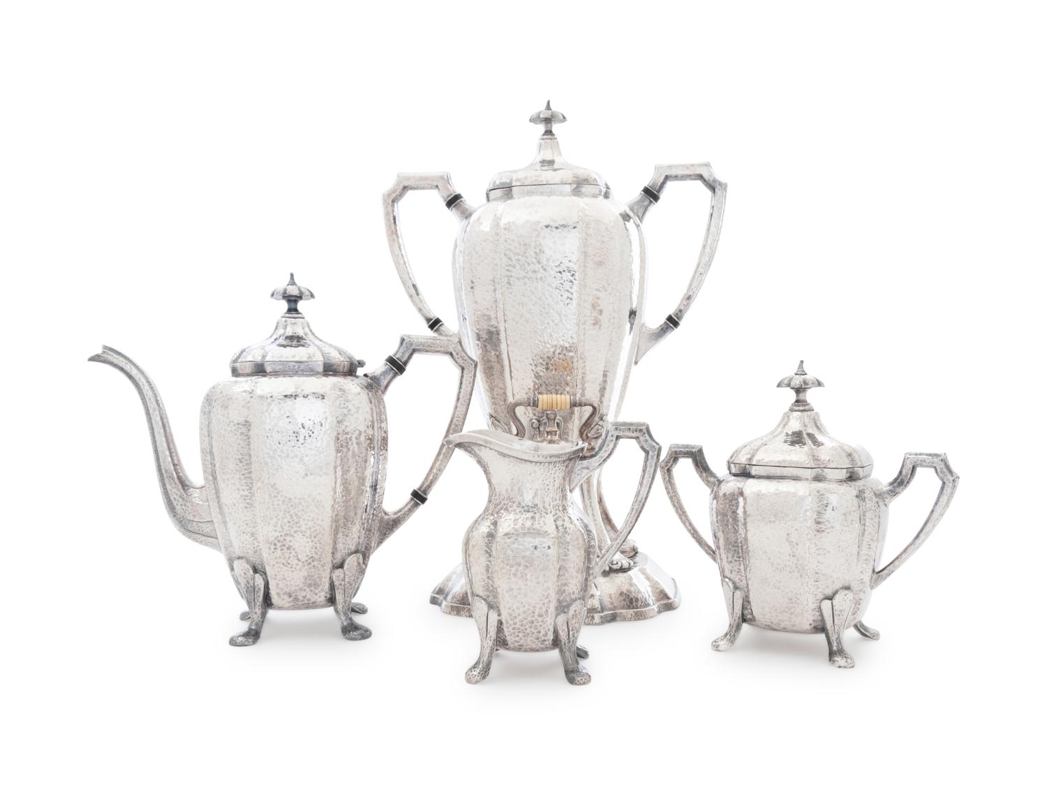 An American Arts & Crafts Silver-Plate Four-Piece Tea Service
