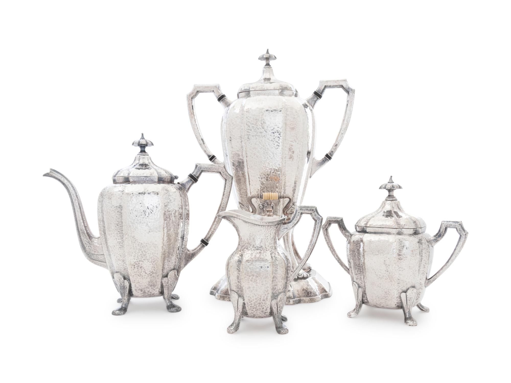 An American Arts & Crafts Silver-Plate Four-Piece Tea Service