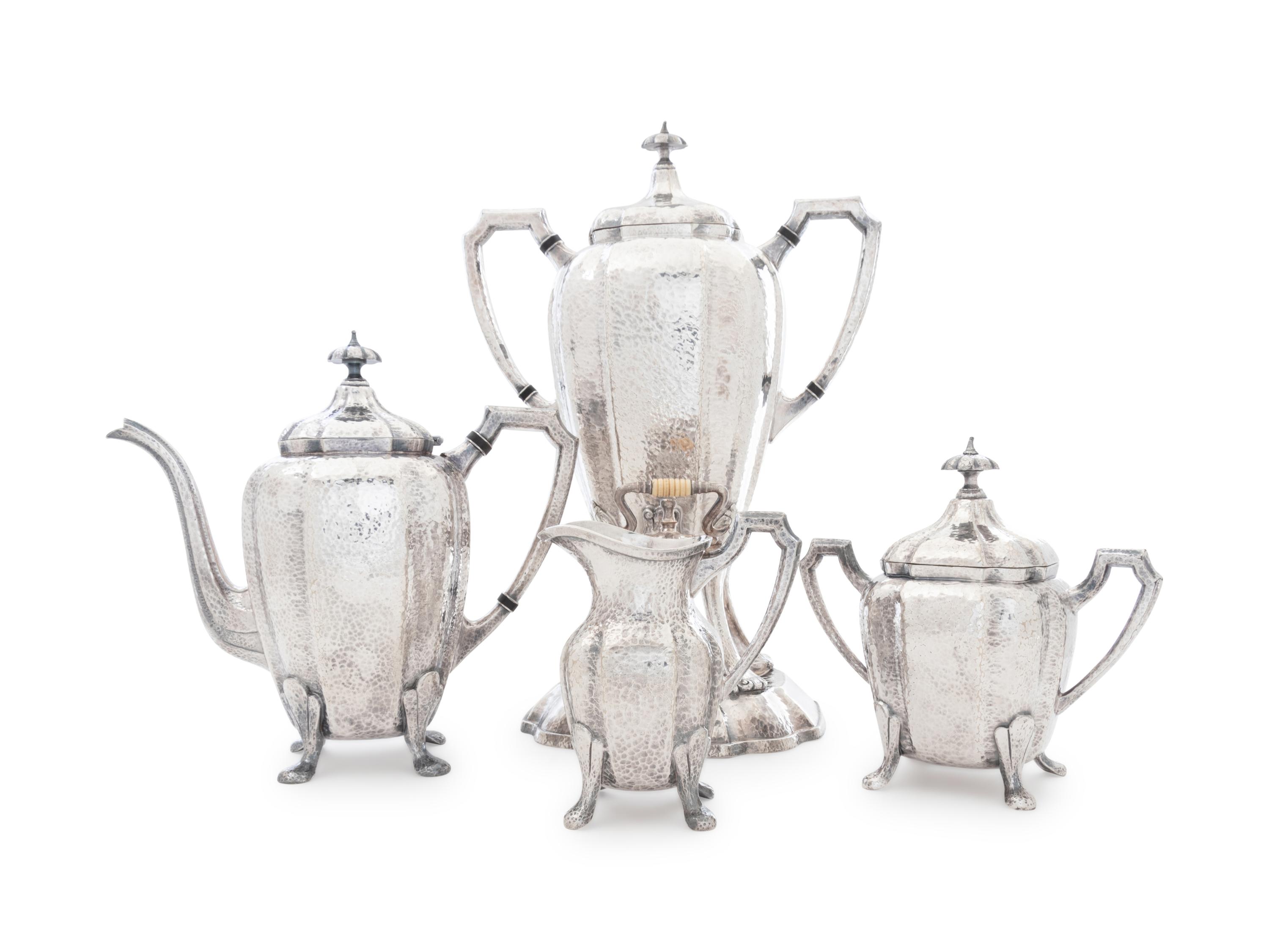An American Arts & Crafts Silver-Plate Four-Piece Tea Service