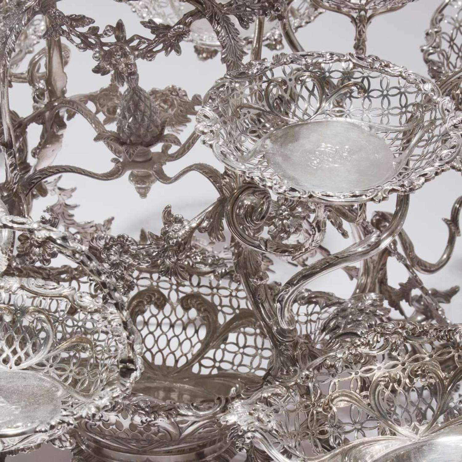 A Victorian sterling silver fourteen-basket epergne Francis Boone Thomas, London, 1884