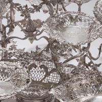 A Victorian sterling silver fourteen-basket epergne Francis Boone Thomas, London, 1884