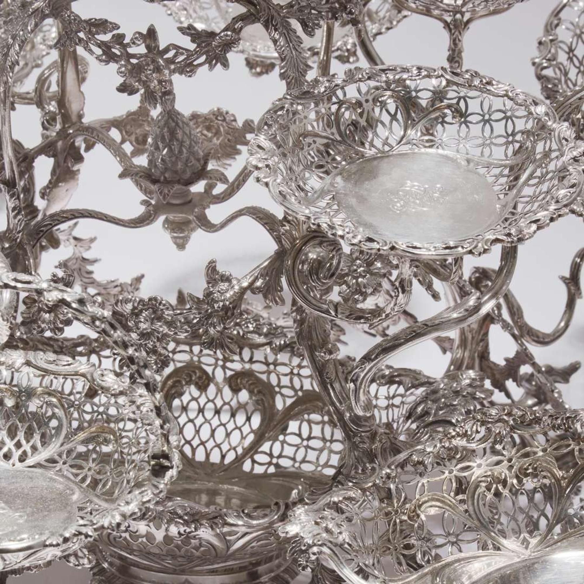 A Victorian sterling silver fourteen-basket epergne Francis Boone Thomas, London, 1884