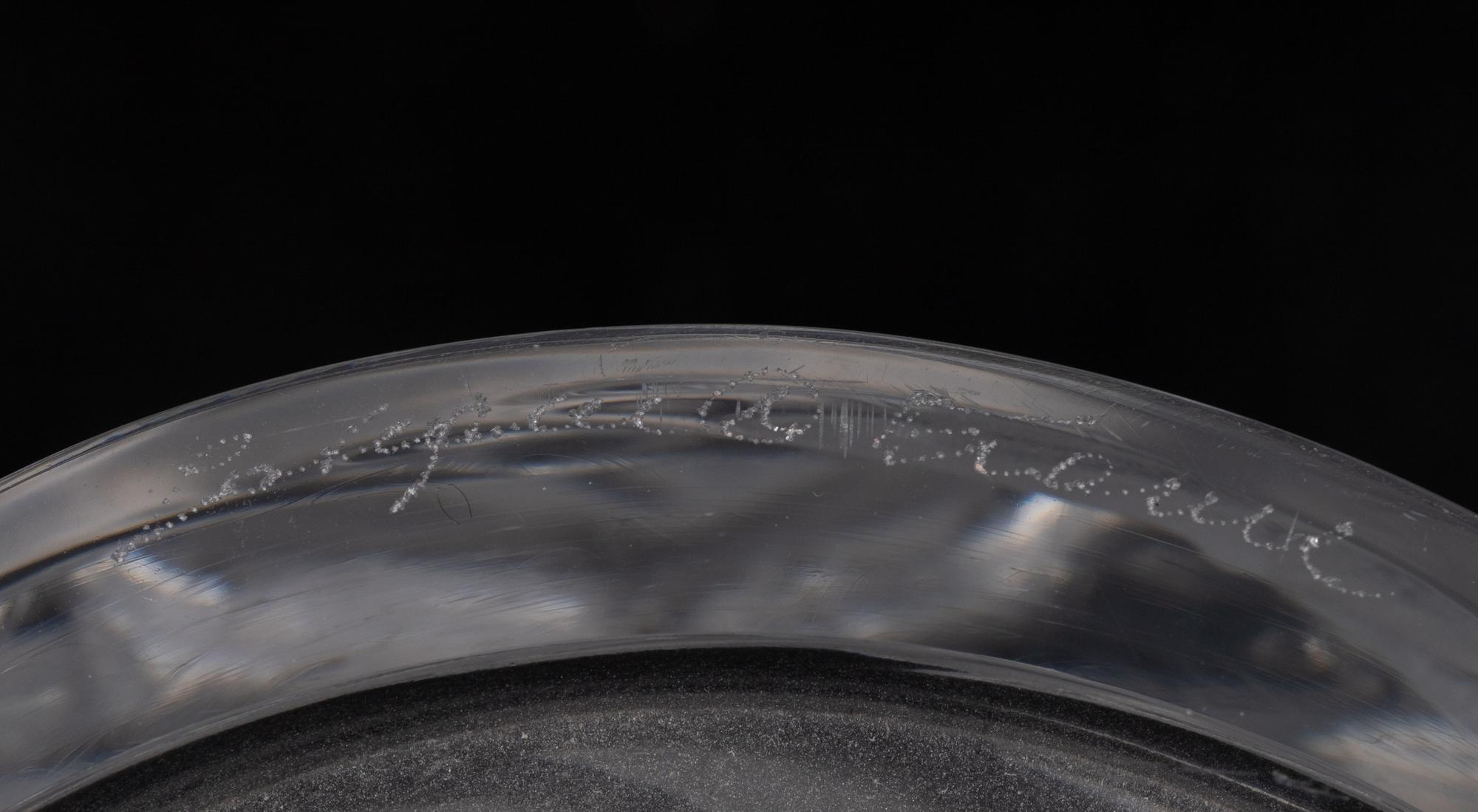 A Lalique Chene Pitcher and Eight Glasses