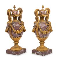 A Pair of French Gilt Bronze Mounted Breche Violette Urns