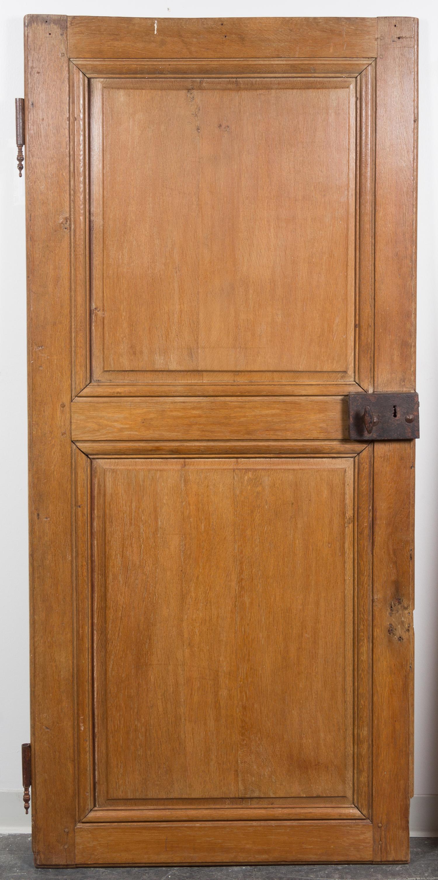 An Iron Mounted Pine Door Height 74 x width 33 1/2 inches. — 19TH CENTURY