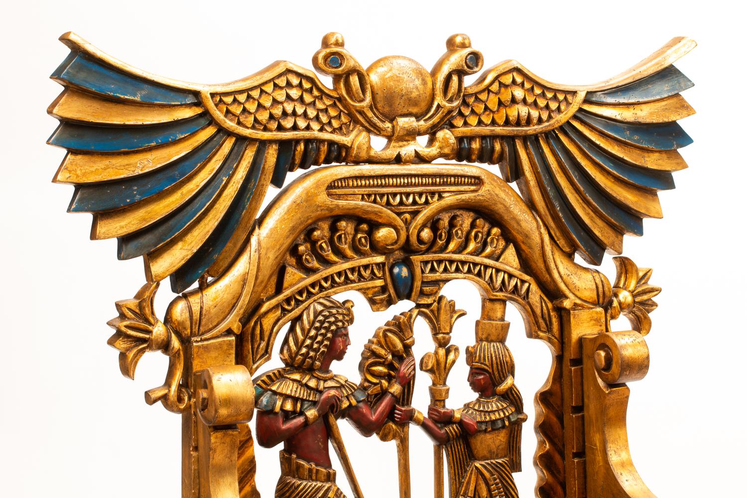 A Pair of Egyptianesque Painted and Giltwood Throne Chairs