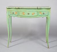 A French Painted Poudreuse, Height 29 x width 29 1/2 x depth 17 inches.