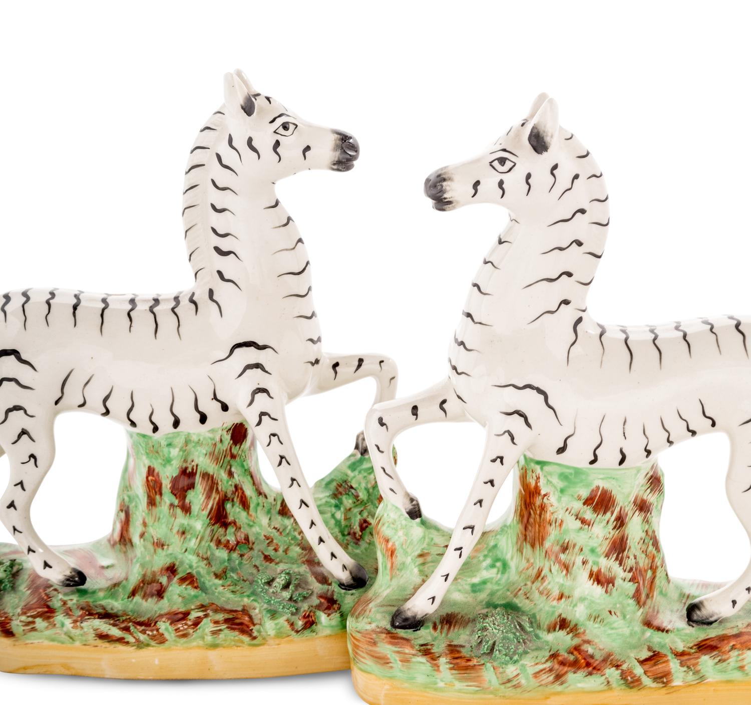 A Pair of Staffordshire Models of Zebras