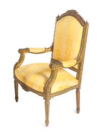 A Pair of Louis XVI Style Carved Giltwood Fauteuils — 20TH CENTURY