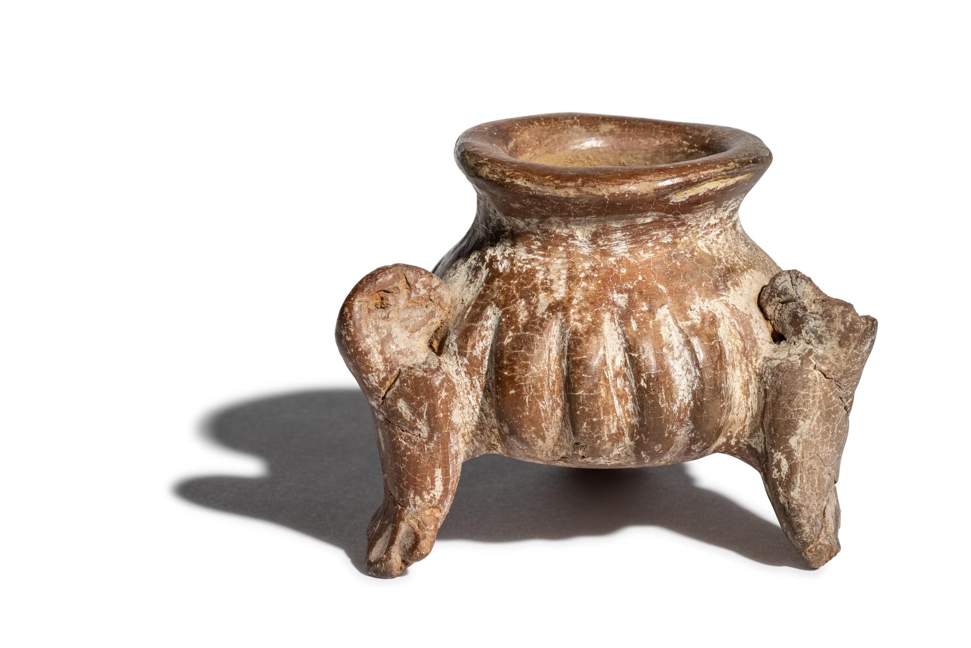 A Group of Three Colima Terracotta Tripod Vessels with Parrot Feet