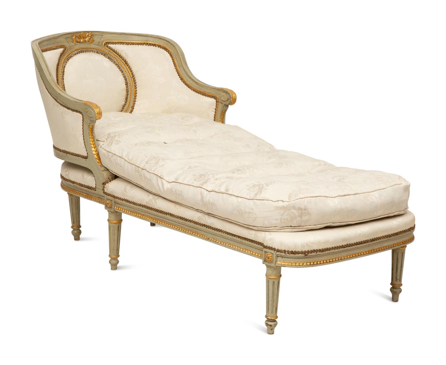 A French Provincial Style Painted and Parcel Gilt Chaise Longue