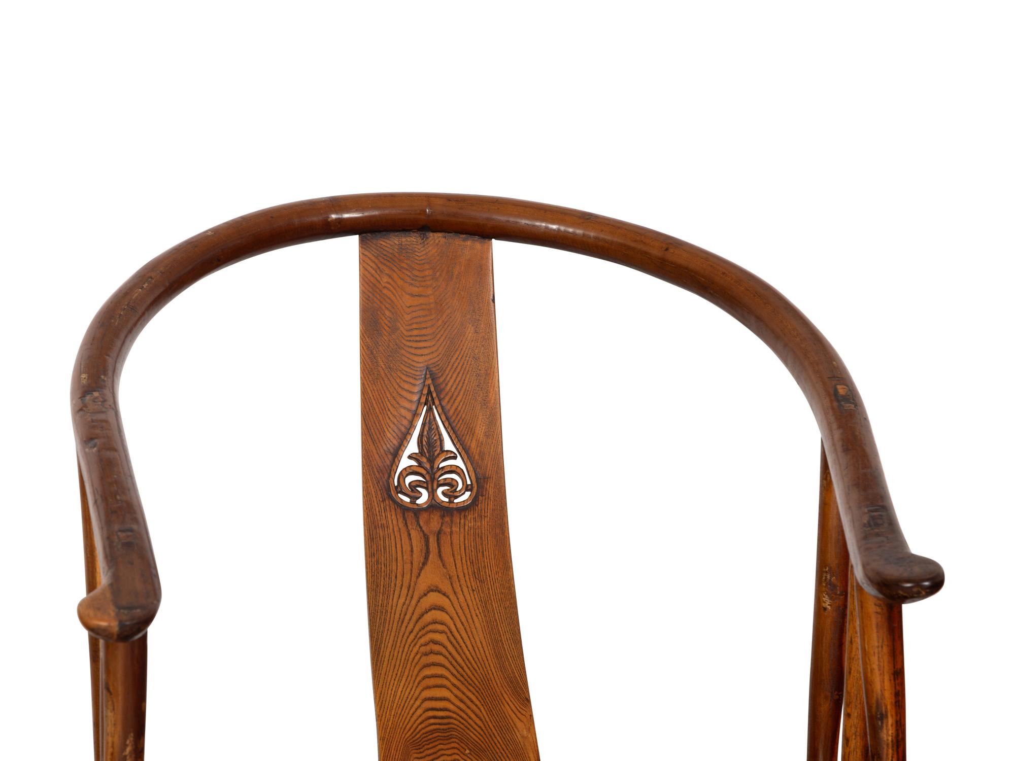 A Pair of Ming Style Elm Horseshoe Back Armchairs