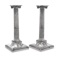 A Group of Four English Silver-Plate Candlesticks